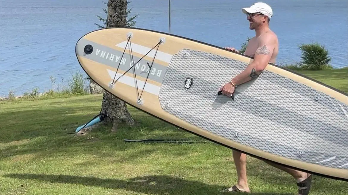 Inflatable paddle board with oak wood grain design perfect for versatile water adventures