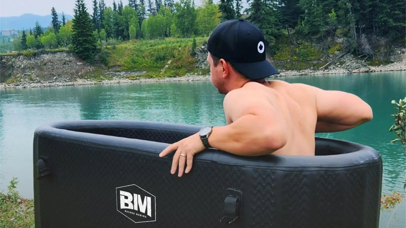 Inflatable cold plunge tub with dual-action hand pump in a marina ice tub setting