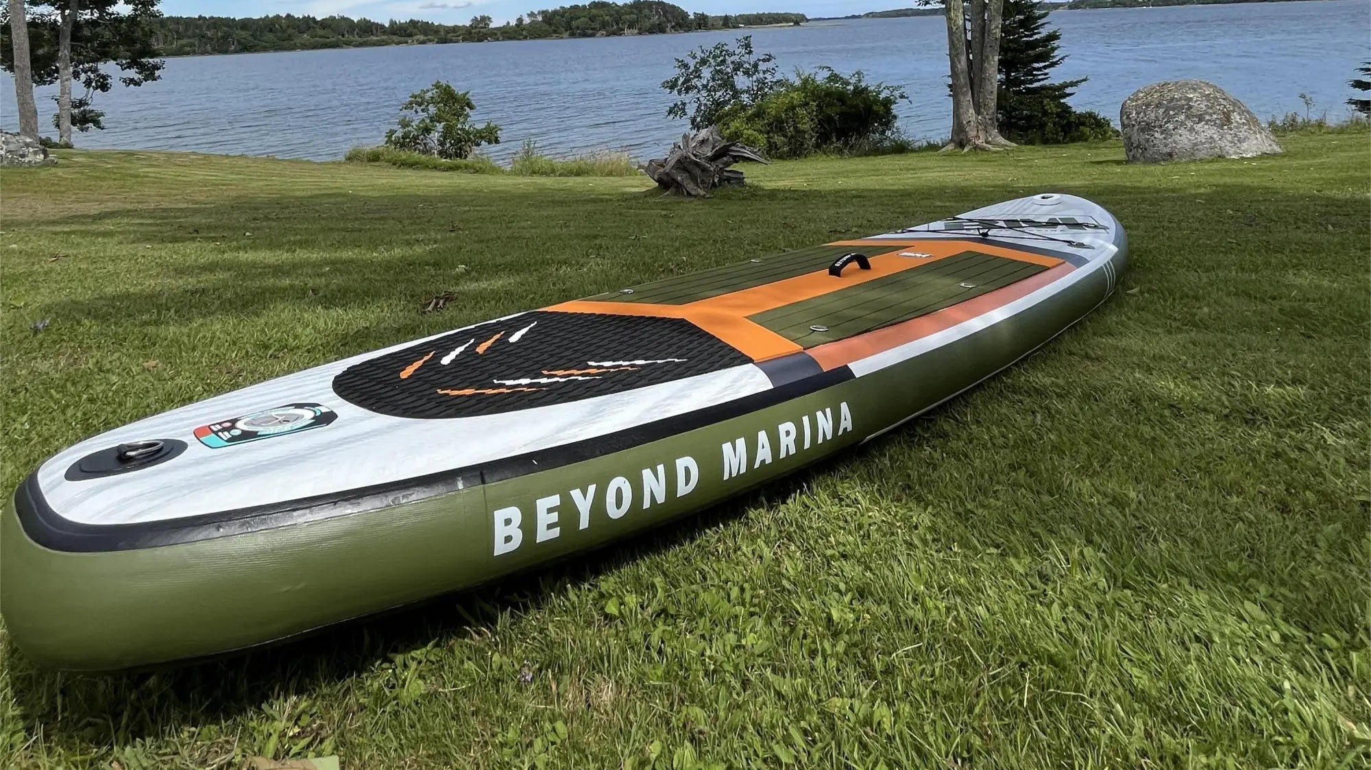 Inflatable golf series paddleboard in military green with wood-grain texture and orange accents