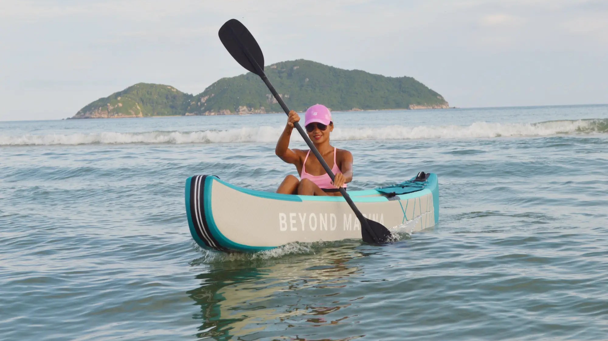 Inflatable kayak with paddle for water exploration using Beyond Marina Drop Stitch Kayak.