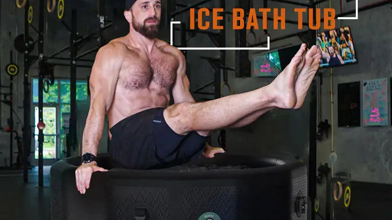 Man doing a squat on a machine near inflatable drop stitch ice tubs in gym setting