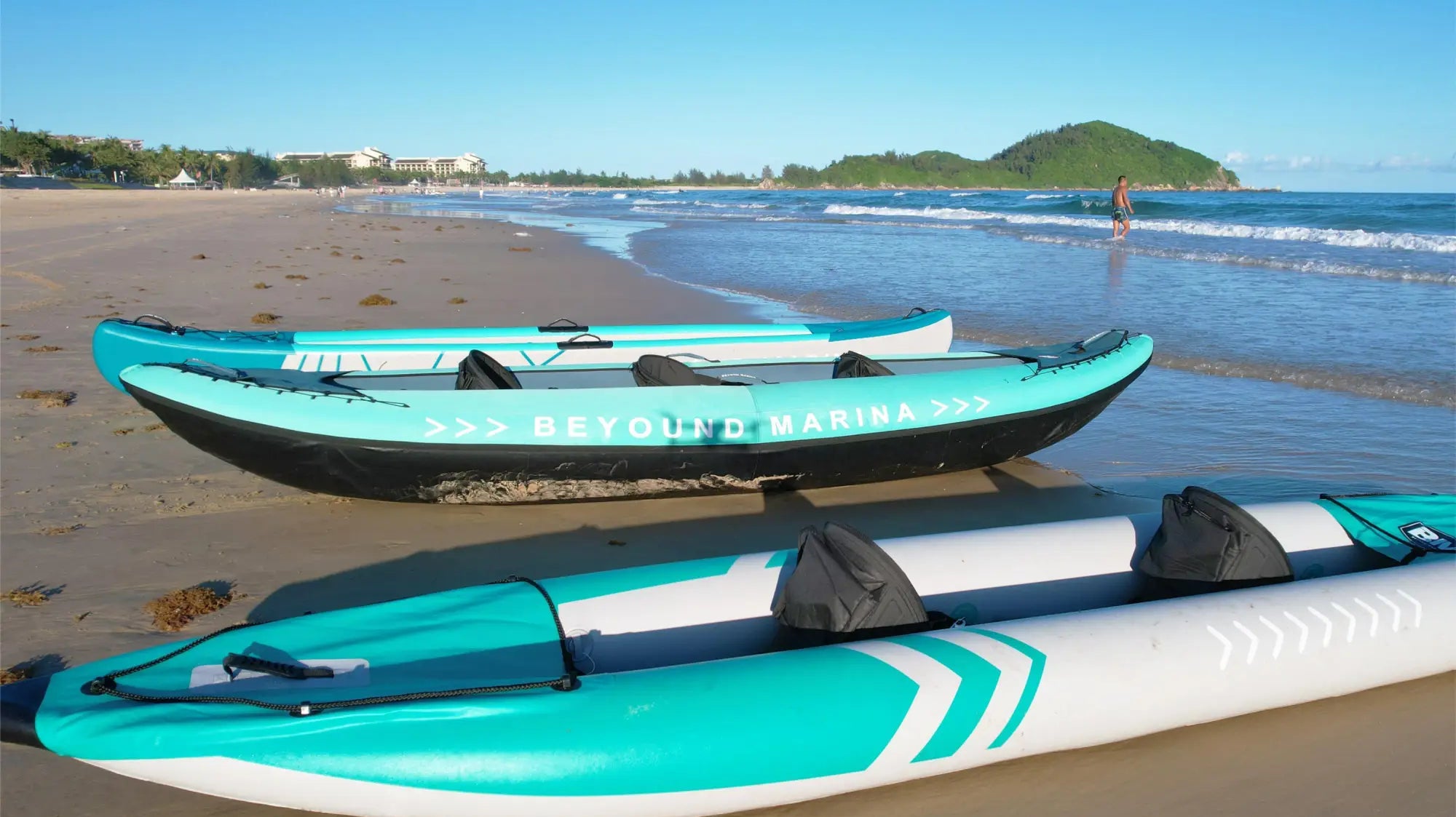 Two inflatable kayaks ready for adventure on the water, perfect for any outdoor enthusiast.