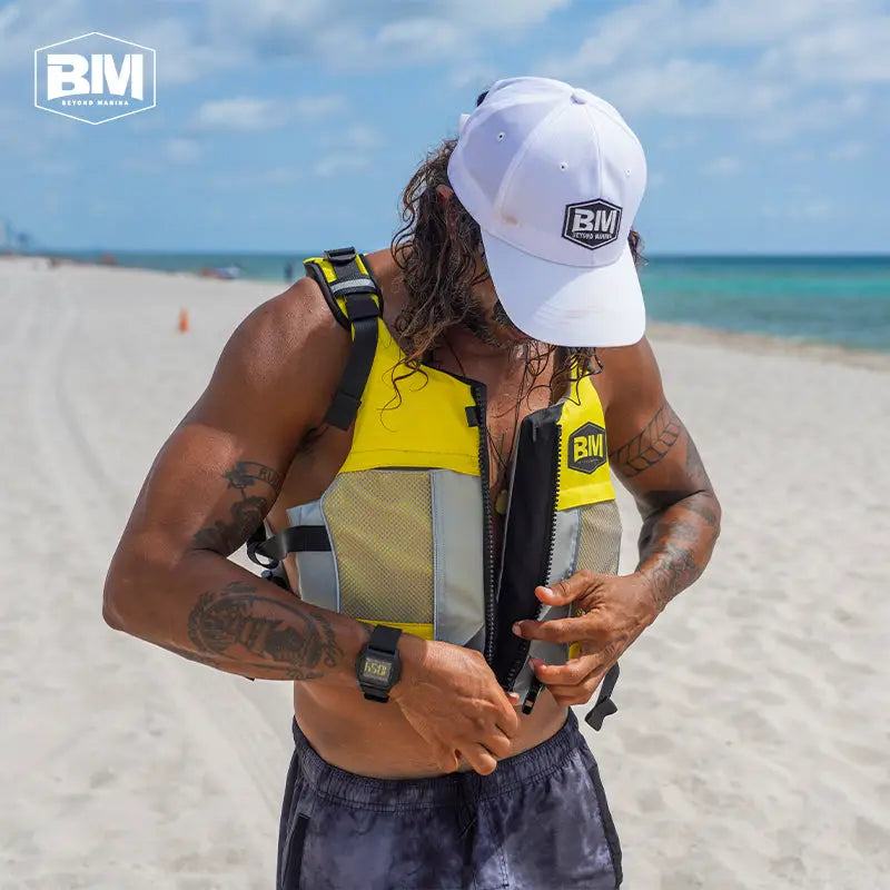 Yellow and gray life vest from Beyond Marina Accessories Collection essential gear add-ons