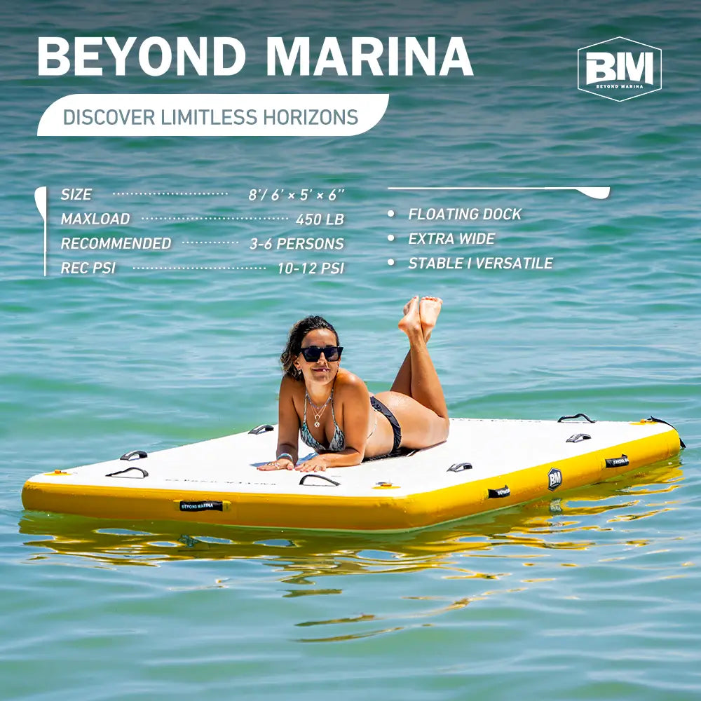 Woman in yellow kayak on water near Beyond Marina AIR DOCK inflatable dock.