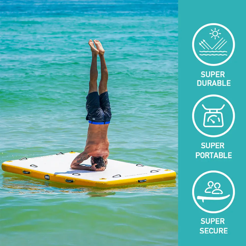 Man doing a handstand on surfboard on Beyond Marina AIR DOCK 8 inflatable dock