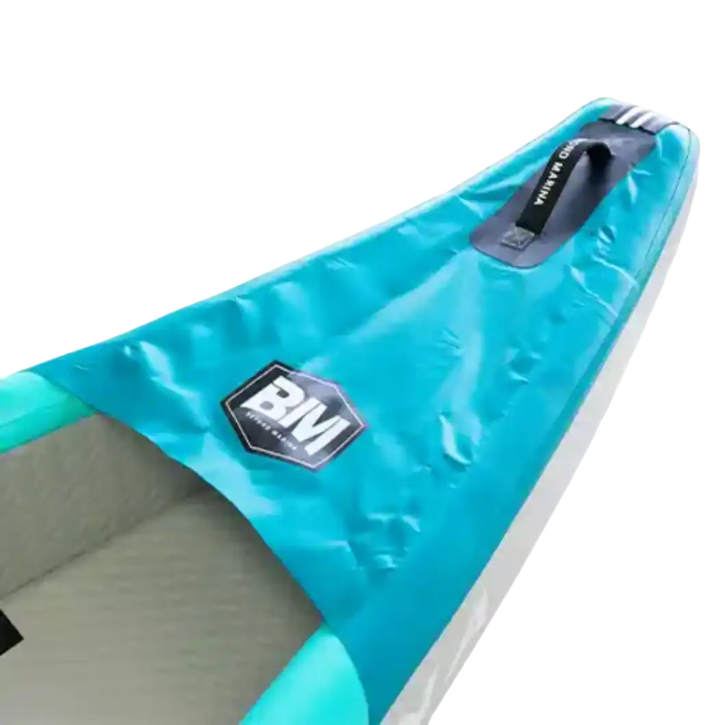 Aqua-colored inflatable kayak end.