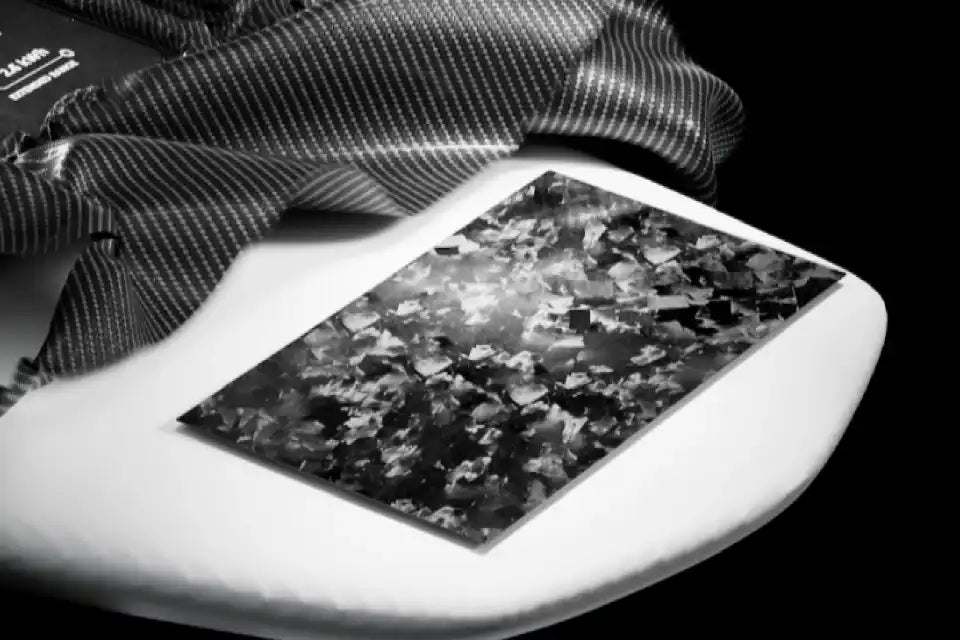 Black and white marbled rectangular panel.