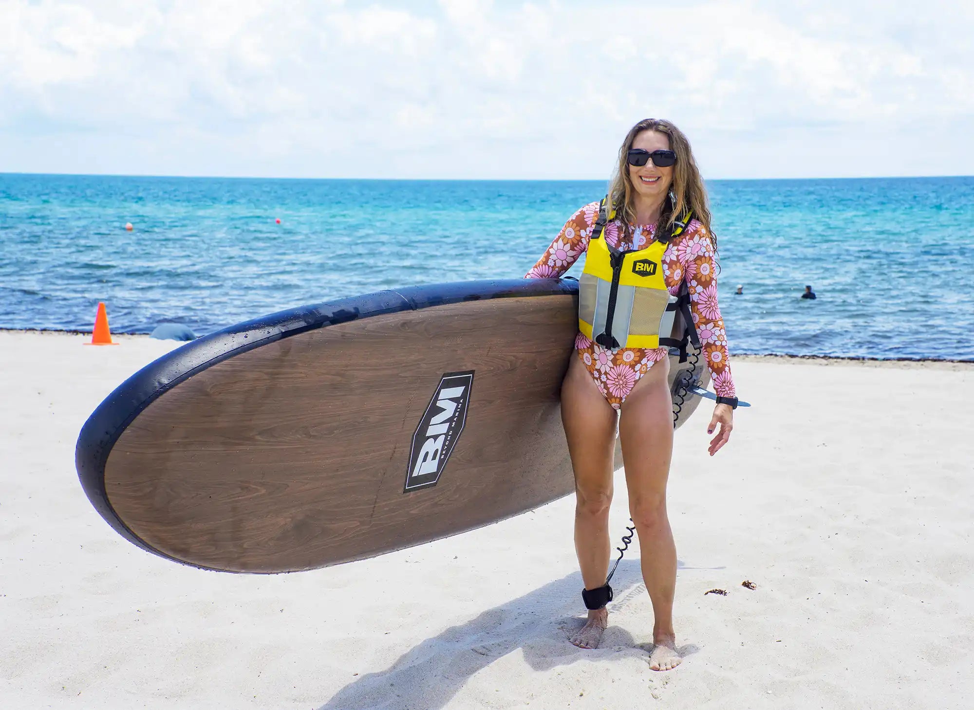 Brown paddleboard with black trim.