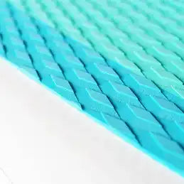 Textured aqua and teal foam pad.
