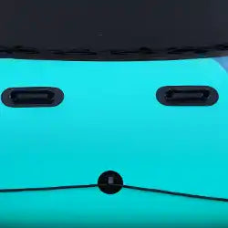 Turquoise inflatable kayak.