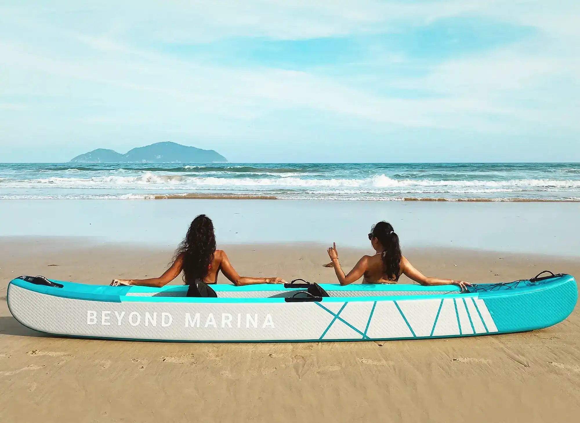 Turquoise and white inflatable kayak.