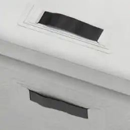 White storage container with handles.