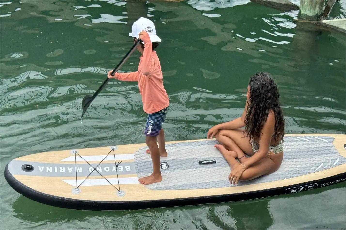 Paddleboard with man and dog demonstrating paddleboarding errors and paddleboard tips