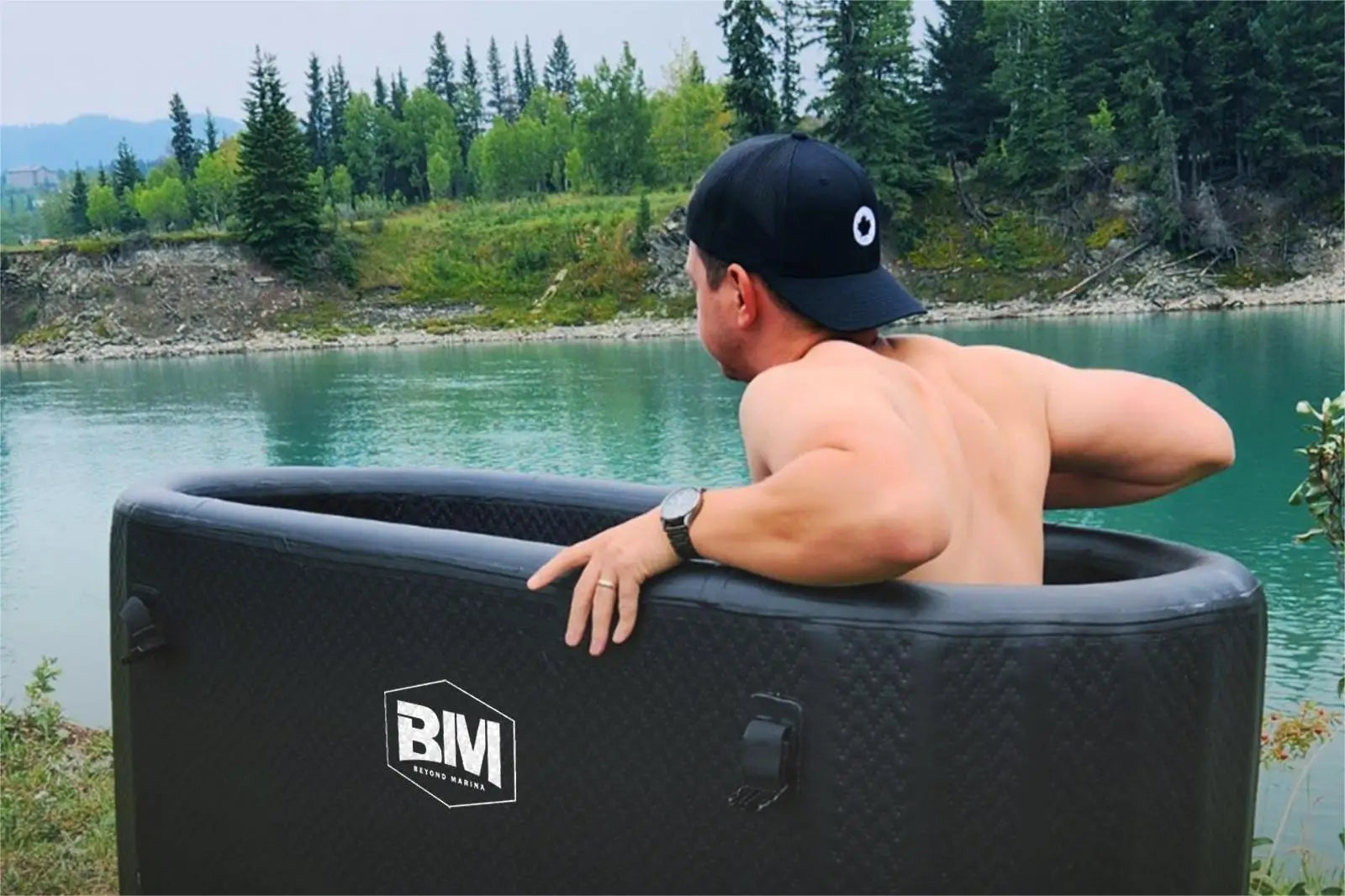 Inflatable cold plunge tub with dual-action hand pump in a marina ice tub setting