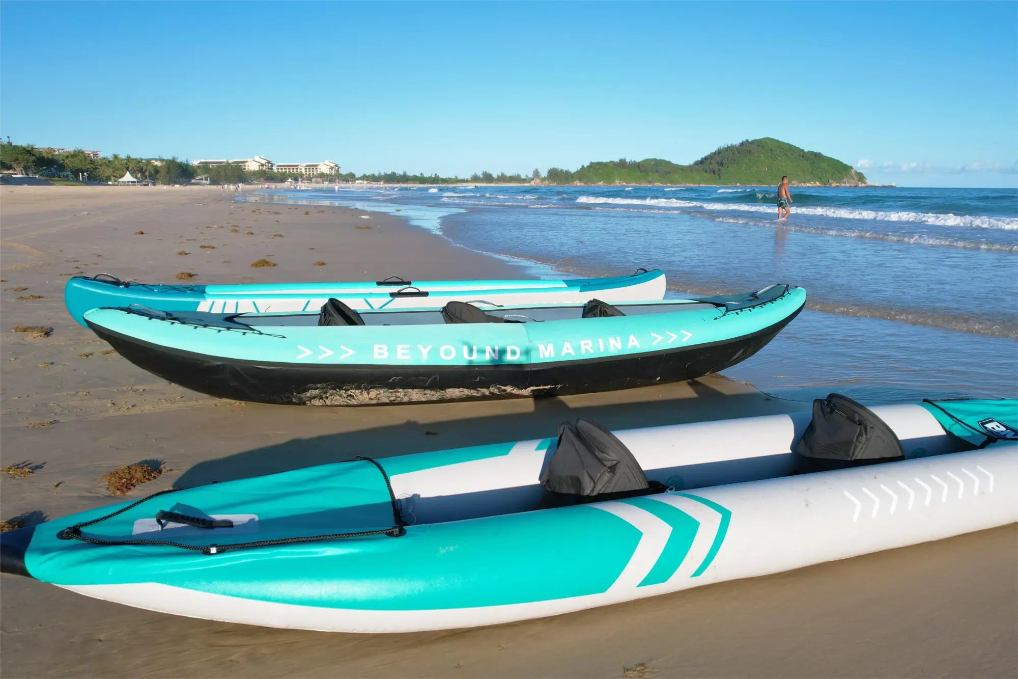 Two inflatable kayaks ready for adventure on the water, perfect for any outdoor enthusiast.
