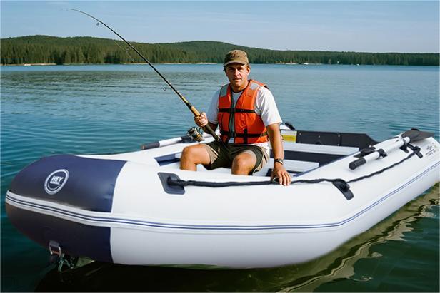 Inflatable fishing boat with person in life vest from Heymarina Series Inflatable with drop-stitch floor