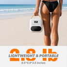 Person holding a portable device on a beach with text about weight and dimensions.