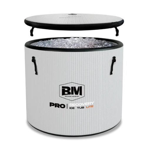 White portable cold plunge tub with handles and detached lid filled with ice for cold water therapy