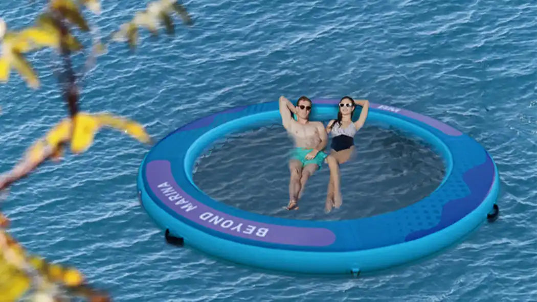 Inflatable blue floating island with two people.