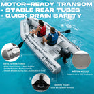 Gray inflatable dinghy boat with black motor for fishing and relaxation