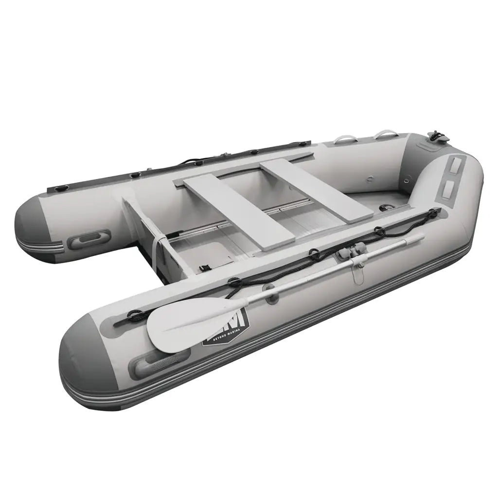 Inflatable gray dinghy boat with oars for fishing and relaxation - Titan model