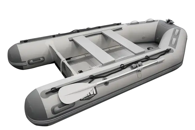 Inflatable gray dinghy boat with oars, ideal for fishing and relaxing at the marina