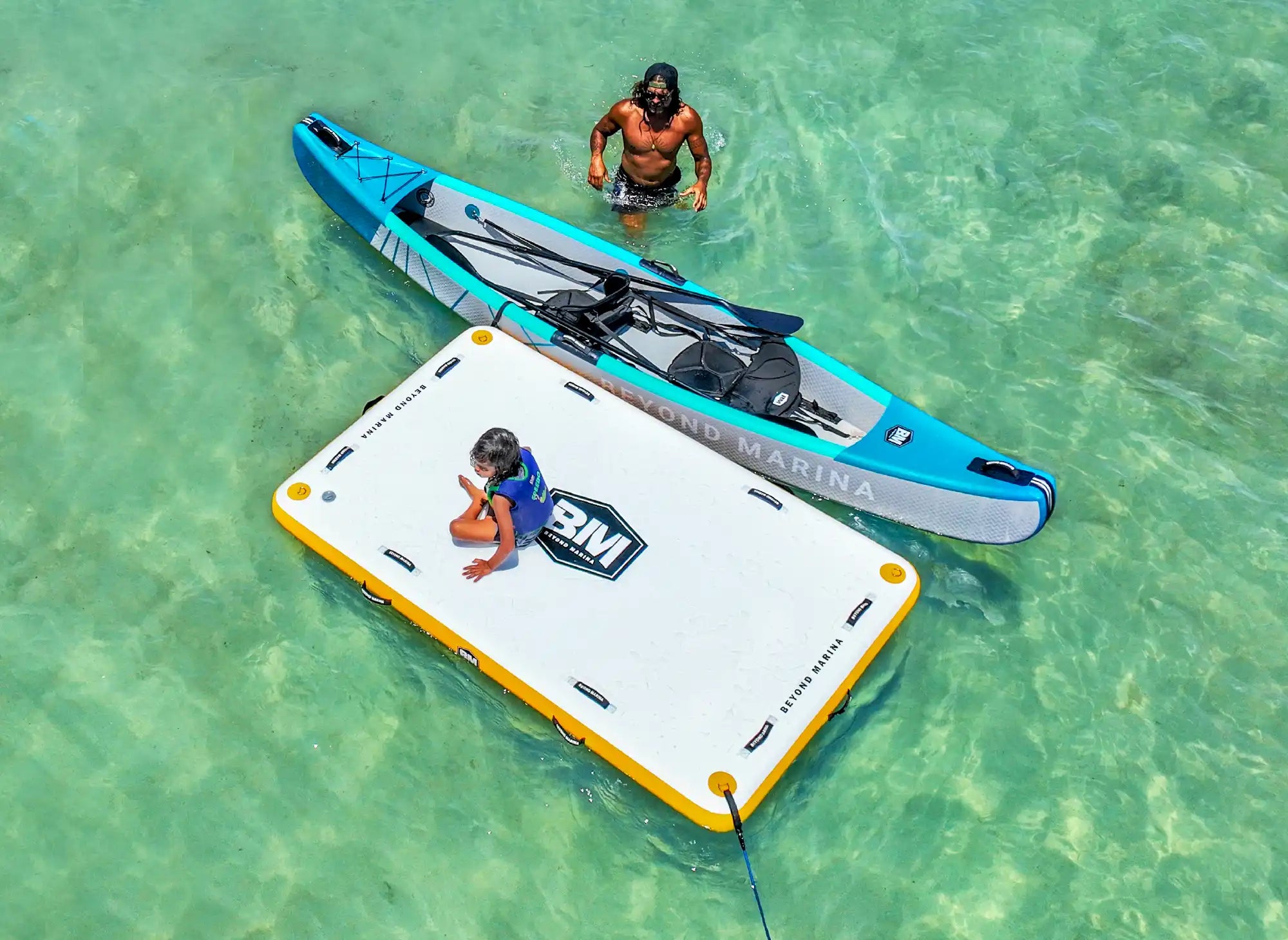 Inflatable floating platform with yellow trim.