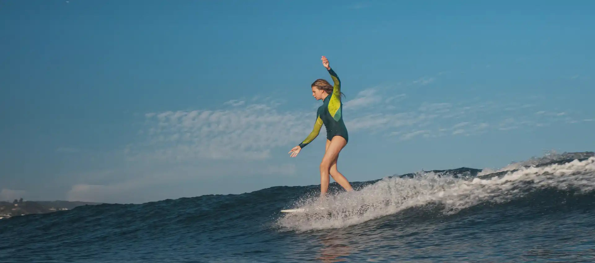 Surfer riding a wave.